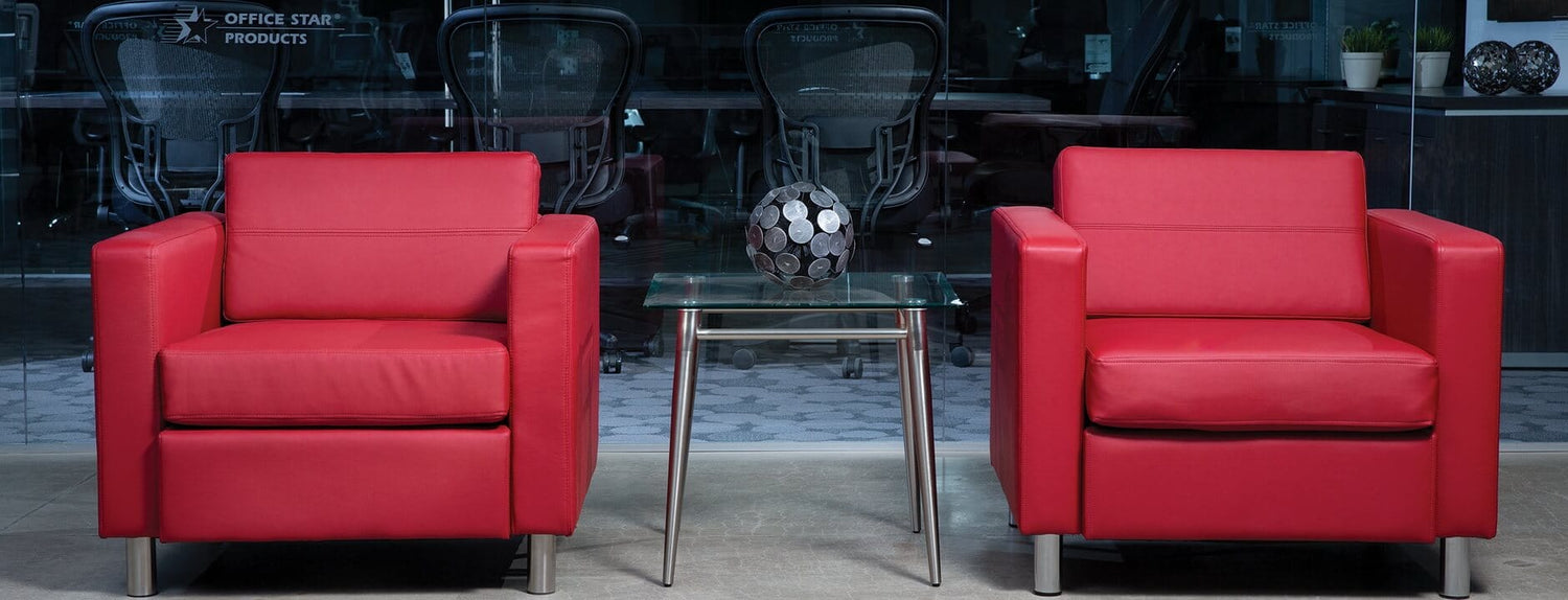 
        Two red Office Star PAC51 chairs in a modern setting
     
