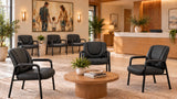 Harwick 820L black top grain leather guest chairs arranged around coffee tables in a modern waiting room
